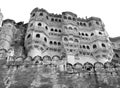 Monochrome image of stunning facade of historic building in Mehrangarh fort, Jodhpur, Rajasthan, India