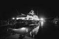 Monochrome photo of luxurious private yacht moored at pier at ni