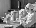 Old Fashioned Woman Working at Kitchen Table