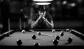 Monochrome photo young man playing billiards Royalty Free Stock Photo