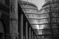 City Hall, London taken from the rear at dusk. Building is reflected in the glass facade of the adjacent building. Royalty Free Stock Photo