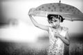 monochrome portrait of happy little girl with umbrella Royalty Free Stock Photo