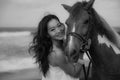 Monochrome. Portrait of happy woman and horse. Woman hugging horse. Romantic concept. Love to animals. Black-white photo. Nature Royalty Free Stock Photo