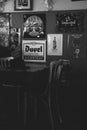 Monochrome portrait of the inside of a Belgian local bar