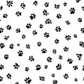 Seamless Pattern of Black Paw Prints on White Background Royalty Free Stock Photo