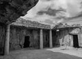 Monochrome shot of the ancient ruins of the Tomb of the Kings in Cyprus Royalty Free Stock Photo