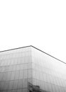 Monochrome shot of modern building against sky Royalty Free Stock Photo