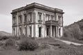 monochrome shot of a stone italianate building with a belvedere