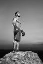 Monochrome shots of a fierce male boxer training outdoors Royalty Free Stock Photo