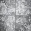 Monochrome Square Stone Tile Wall Pattern with Natural Textures and Variations Royalty Free Stock Photo