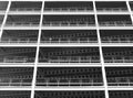 monochrome view of large modern commercial building under construction with steel beams and girders