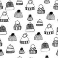 Monochrome winter seamless pattern with knitted hats.