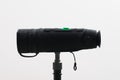 Monocular on a tripod isolated on a white field. Royalty Free Stock Photo