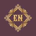 Monogram EN letters - concept logo template design. Crest heraldic luxury golden emblem. Initial E & N. Vector illustration Royalty Free Stock Photo
