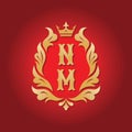 Monogram NM letters - concept logo template design. Crest heraldic luxury emblem. Golden leaves and crown. Initials N & M. Vector Royalty Free Stock Photo