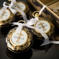 Monogrammed Pocket Watches as Wedding Favors Royalty Free Stock Photo