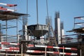 Monolithic construction of a multi-storey apartment building. Construction site. Construction in progress and concrete house frame Royalty Free Stock Photo