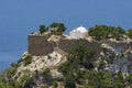 Monolithos medieval fortress and church on a mountain cliff Rhodes, Greece