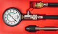 Monometer close-up. Engine compression tester isolated on white background. Set for testing the internal combustion