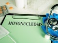 Mononucleosis diagnosis on the green sheet. Royalty Free Stock Photo