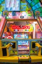 Monopoly coin pusher edition Arcade game manufactured by Sega Japanese company, is based on the classic board game. Royalty Free Stock Photo