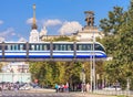 Monorail train on a background of the main entrance of ENEA