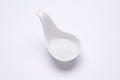 Monotone sea salt 1 tablespoon in a white spoon
