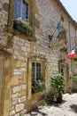 Town hall in the medieval bastide town of Monpazier is the Dordogne region of France