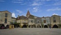 MONPAZIER, FRANCE - SEPTEMBER 10, 2015: Main square in the bastide of Monpazier, Dordogne, France, September 2015