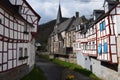 Monreal, Germany - 04 14 2022: Elz at the church Monreal, with the half-timbered houses around Royalty Free Stock Photo
