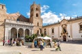 Tourists visiting Cathedral in the historic center of Monreale, Sicily