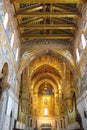 Monreale, Sicily, Italy - Apr 11th 2019: Amazing interior of Cathedral of Monreale, Duomo di Monreale. Golden mosaic Royalty Free Stock Photo