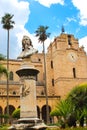 Monreale, Sicily, Italy - Apr 11th 2019: Famous Cathedral of Monreale, Duomo di Monreale from outside with bust of painter Novelli