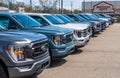 Monroeville, Pennsylvania, USA April 16, 2023 A line of new Ford F150 pickup trucks for sale at a dealership Royalty Free Stock Photo