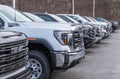 Monroeville, Pennsylvania, USA December 25, 2023 A line of new GMC four door pickup trucks for sale at a dealership Royalty Free Stock Photo