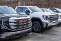 Monroeville, Pennsylvania, USA December 25, 2023 A line of new GMC four door pickup trucks for sale at a dealership Royalty Free Stock Photo