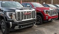 Monroeville, Pennsylvania, USA December 25, 2023 A line of new GMC four door pickup trucks for sale at a dealership Royalty Free Stock Photo