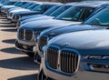 Monroeville, Pennsylvania, USA February 25, 2024 A line of new BMW vehicles for sale at a dealership