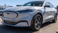 Monroeville, Pennsylvania, USA February 25, 2024 A new electric Ford Mustang sedan for sale at a dealership