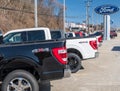 Monroeville, Pennsylvania, USA February 27, 2022 Used Ford trucks for sale line up at a dealership Royalty Free Stock Photo