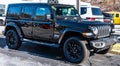 Monroeville, Pennsylvania, USA January 15, 2023 A new, black four door Jeep Wrangler for sale at a dealership