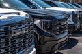 Monroeville, Pennsylvania, USA March 24, 2024 A line of GMC pickup trucks for sale at a dealership Royalty Free Stock Photo