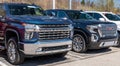 Monroeville, Pennsylvania, USA March 26, 2023 Two black pick up trucks, a GMC and a Chevrolet for sale at a dealership Royalty Free Stock Photo