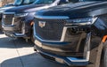 Monroeville, Pennsylvania, USA March 24, 2024 Two Cadillac Escalade SUVs for sale at a dealership