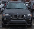 Monroeville, Pennsylvania, USA October 15, 2023 A new, black BMW SUV for sale at a dealership