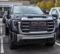 Monroeville, Pennsylvania, USA October 15, 2023 A new GMC pickup truck for sale at a dealership