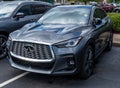 Monroeville, Pennsylvania, USA September 25, 2022 A gray Infiniti car for sale at a dealership Royalty Free Stock Photo