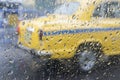 Monsoon abstract image, yellow taxi Royalty Free Stock Photo