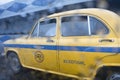 Monsoon abstract image, yellow taxi