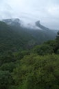 Monsoon clouds and a mountain scene